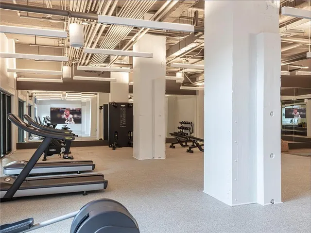 a view of a room with gym equipment