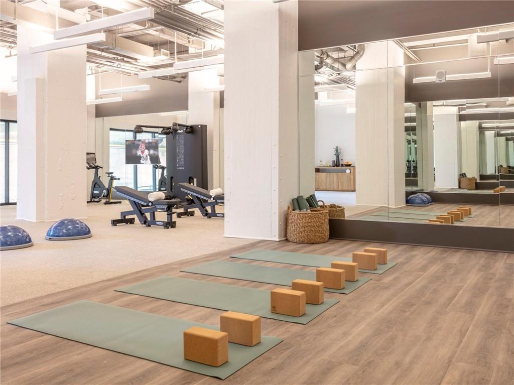 125 Ted Turner Drive Southwest, Unit 802 Atlanta, GA 30303 - Photo 15 of 21 a view of a lobby with furniture and floor to ceiling window