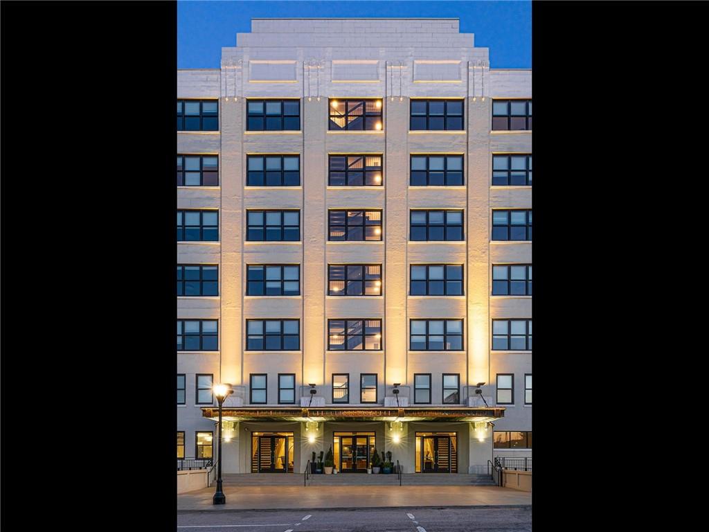 125 Ted Turner Drive Southwest, Unit 802 Atlanta, GA 30303 - Photo 19 of 21 a front view of a building with glass windows