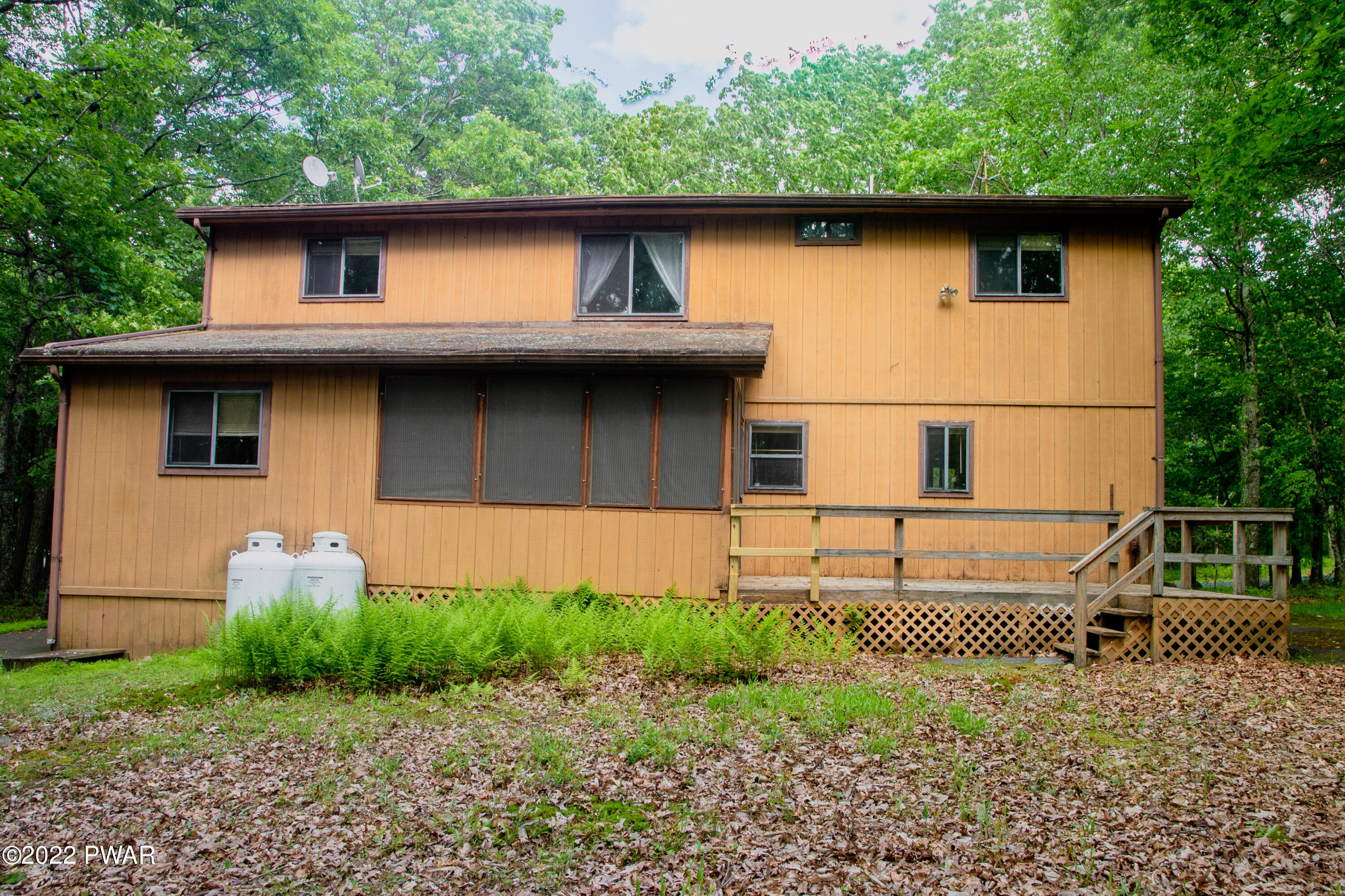 375 Mallard Lane Bushkill, PA 18324 - Photo 27 of 28 a house with trees in the background