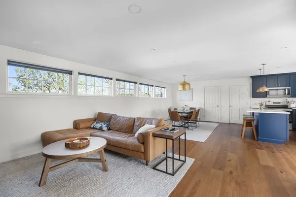a living room with furniture and a table