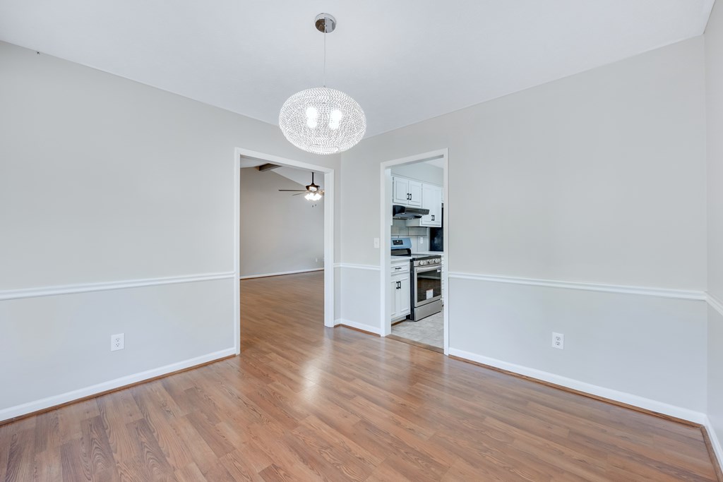 3330 Fortson Road Fortson, GA 31808 - Photo 24 of 46 an empty room with wooden floor and window