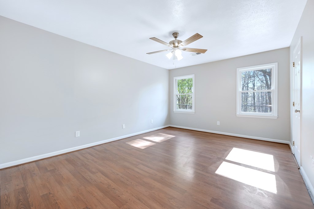 3330 Fortson Road Fortson, GA 31808 - Photo 36 of 46 wooden floor in an empty room with a window