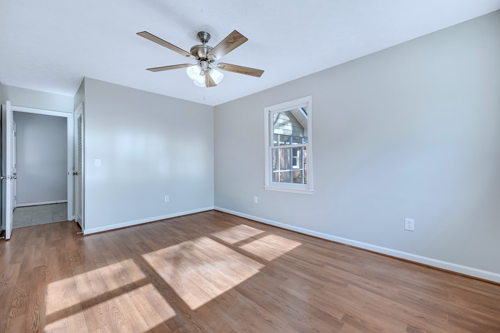 3330 Fortson Road Fortson, GA 31808 - Photo 44 of 46 wooden floor in an empty room with a window