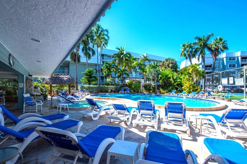 1901 South Roosevelt Boulevard, Unit 404S Key West, FL 33040 - Photo 25 of 39 a view of a chairs and table in a patio