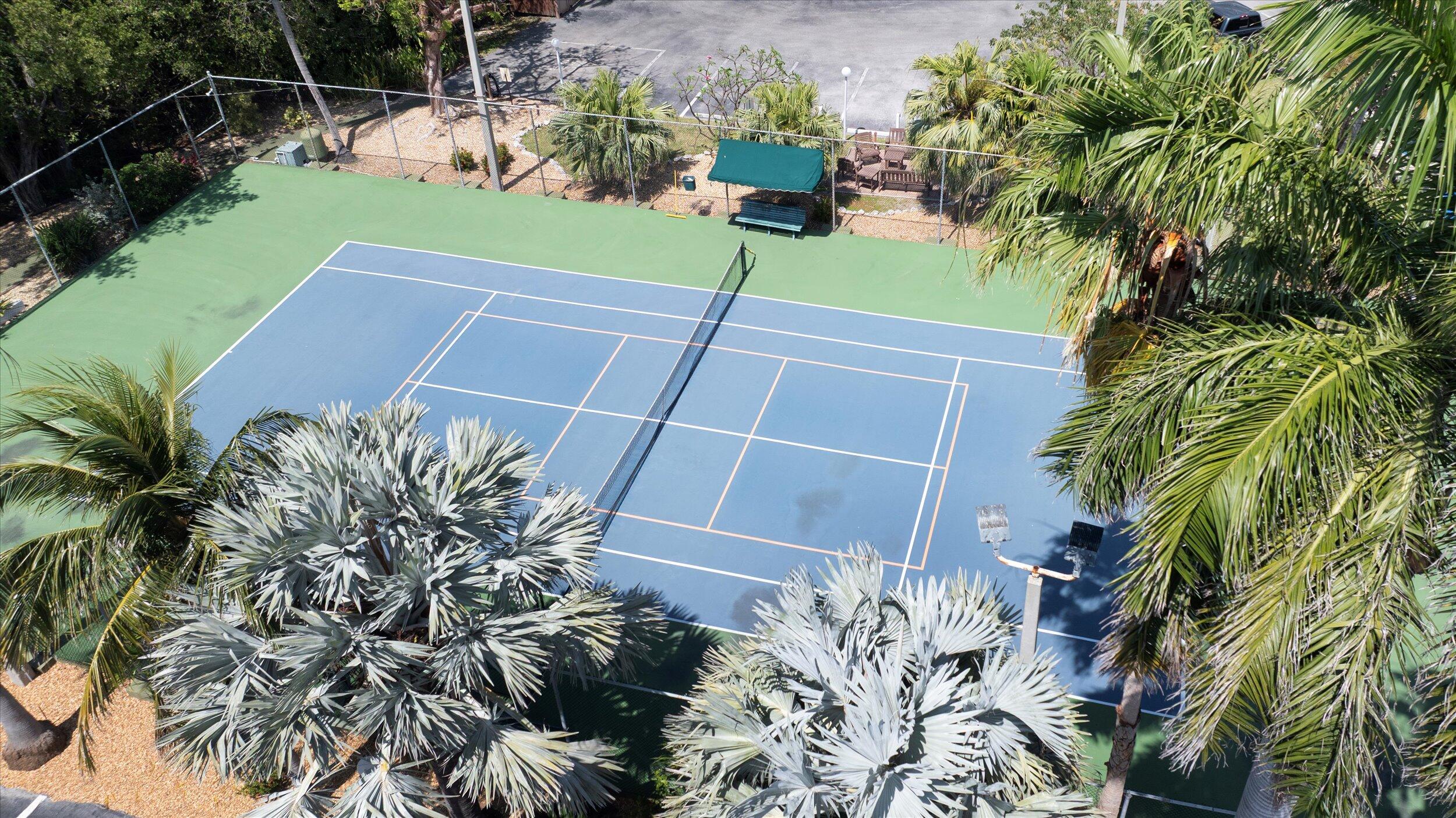 1901 South Roosevelt Boulevard, Unit 404S Key West, FL 33040 - Photo 28 of 39 a view of a backyard