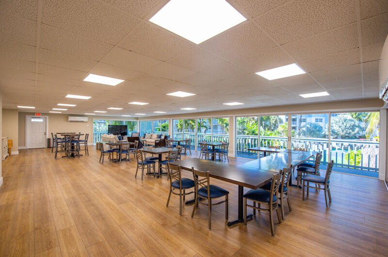 1901 South Roosevelt Boulevard, Unit 404S Key West, FL 33040 - Photo 31 of 39 a view of a dining room with furniture window and outside view
