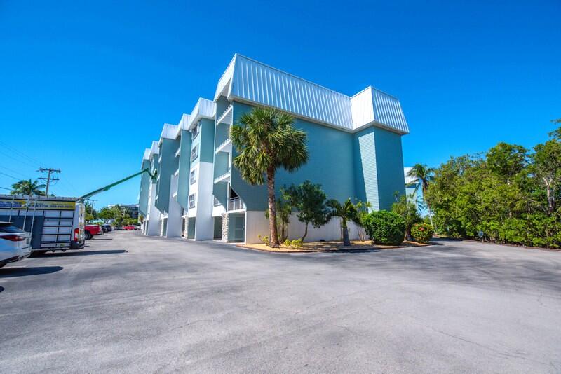 1901 South Roosevelt Boulevard, Unit 404S Key West, FL 33040 - Photo 34 of 39 a view of a house with a street