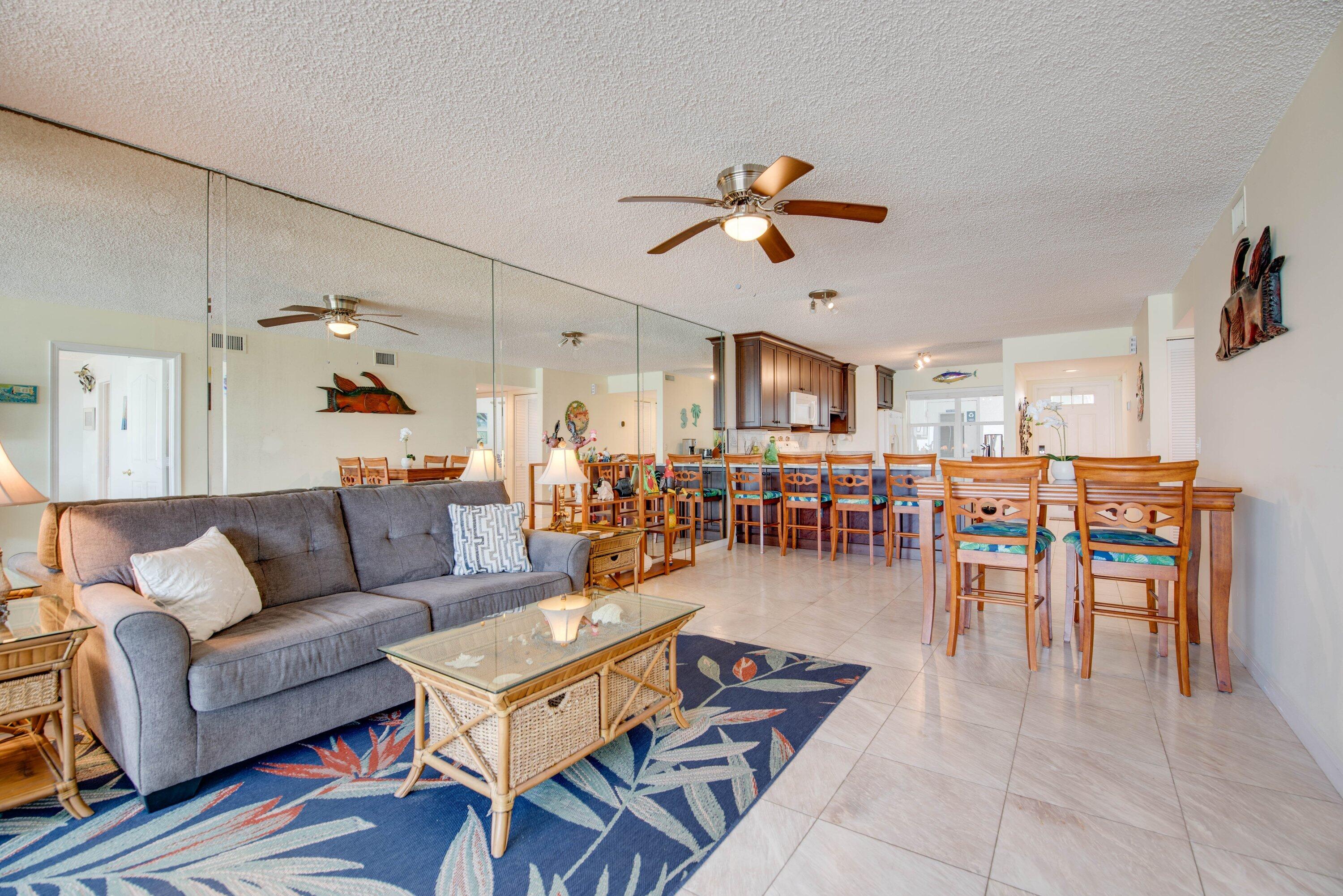 1901 South Roosevelt Boulevard, Unit 404S Key West, FL 33040 - Photo 6 of 39 a living room with furniture and kitchen view
