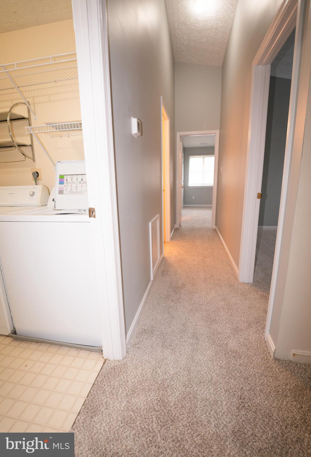 2108 Whitehall Road, Unit 2D Frederick, MD 21702 - Photo 12 of 32 hallway to bedrooms, baths and laundry