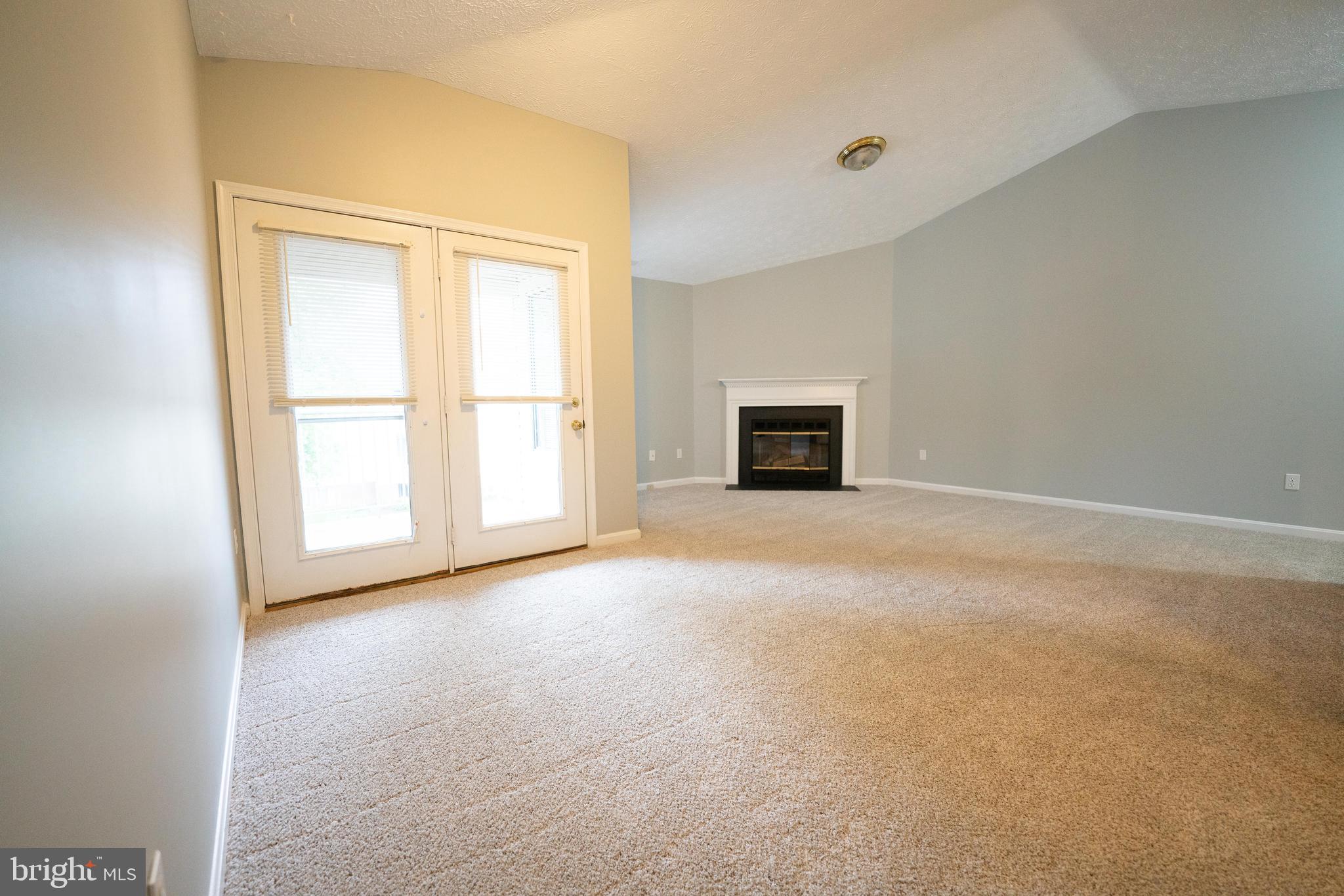 2108 Whitehall Road, Unit 2D Frederick, MD 21702 - Photo 27 of 32 living room with French-style doors to balcony