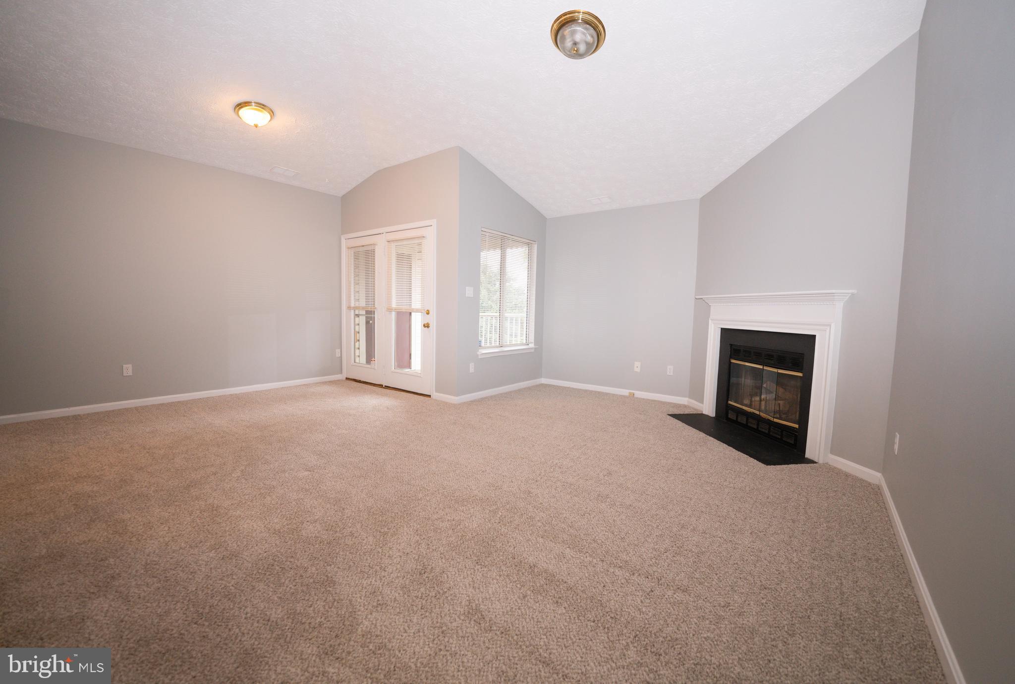 2108 Whitehall Road, Unit 2D Frederick, MD 21702 - Photo 3 of 32 large living room with tons of natural light