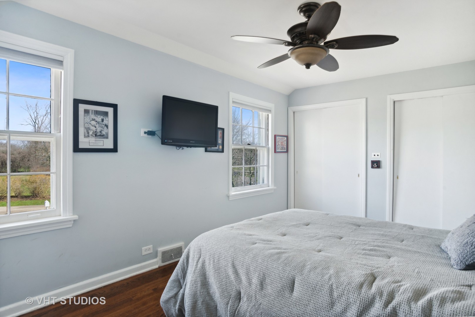 2110 Middlefork Road Northfield, IL 60093 - Photo 23 of 34 a bedroom with a bed and a flat screen tv