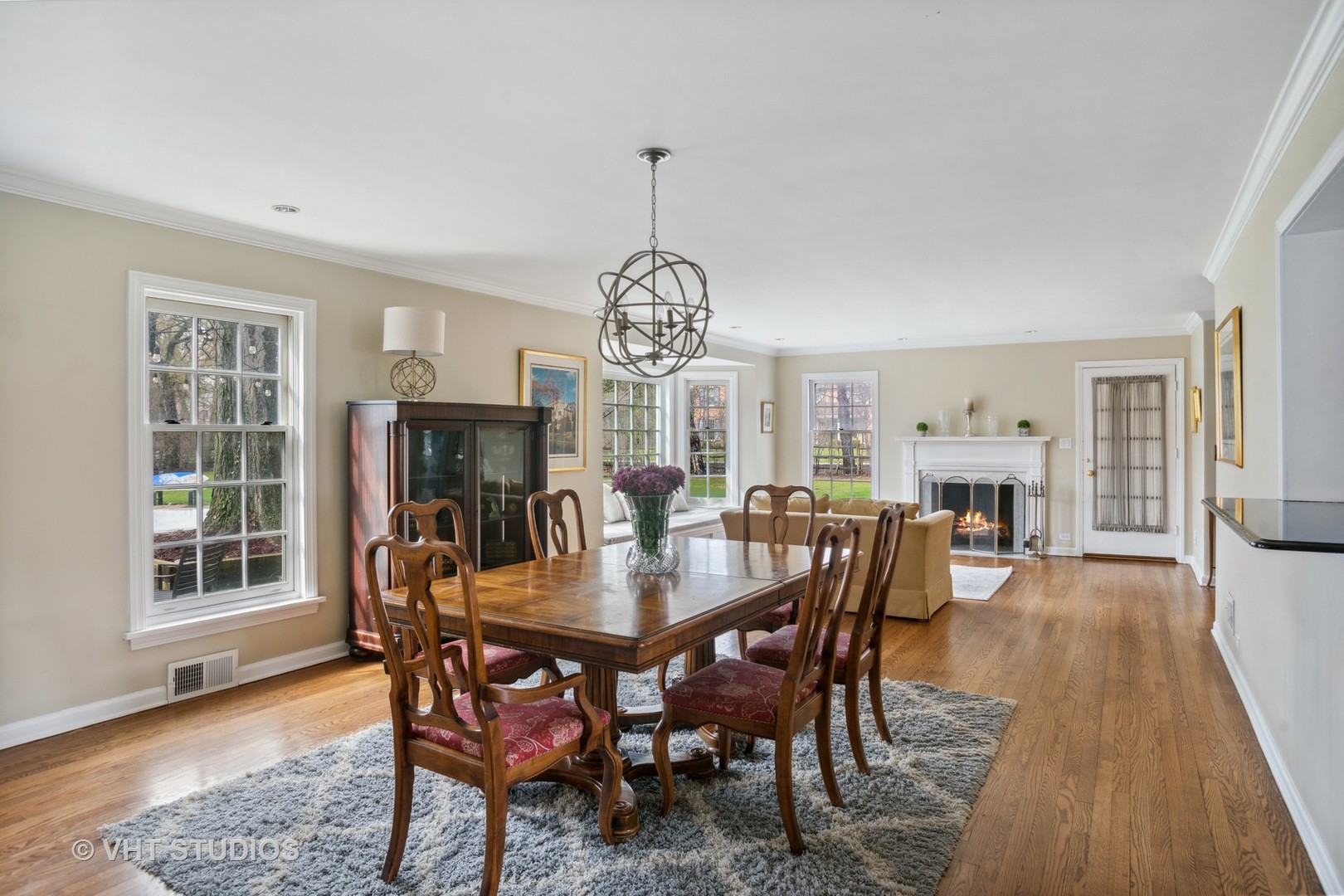 2110 Middlefork Road Northfield, IL 60093 - Photo 3 of 34 a view of a dining room with furniture window and wooden floor
