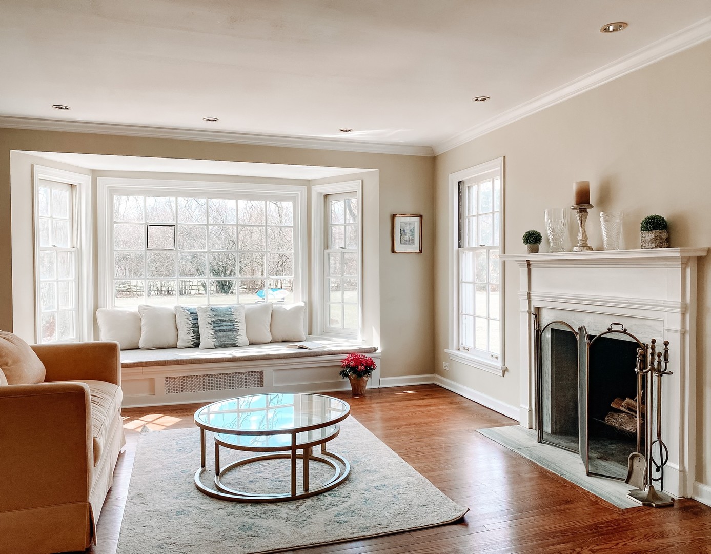 2110 Middlefork Road Northfield, IL 60093 - Photo 6 of 34 a living room with furniture a fireplace and a large window