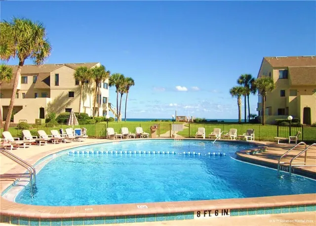 a view of a swimming pool with an outdoor space