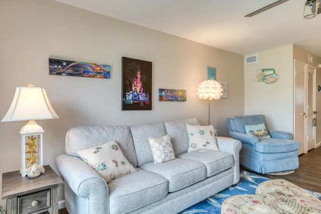 a living room with furniture and a window
