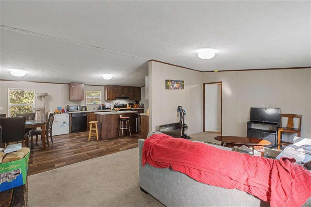 1343 Prior Station Road Cedartown, GA 30125 - Photo 7 of 39 a bed room with a bed and a television