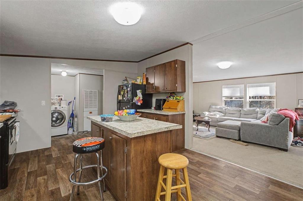 1343 Prior Station Road Cedartown, GA 30125 - Photo 10 of 39 a view of a dining room with furniture