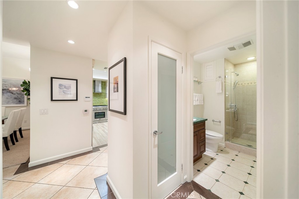 4557 Haskell Avenue, Unit 301 Encino, CA 91436 - Photo 28 of 40 a bathroom with a shower and a sink