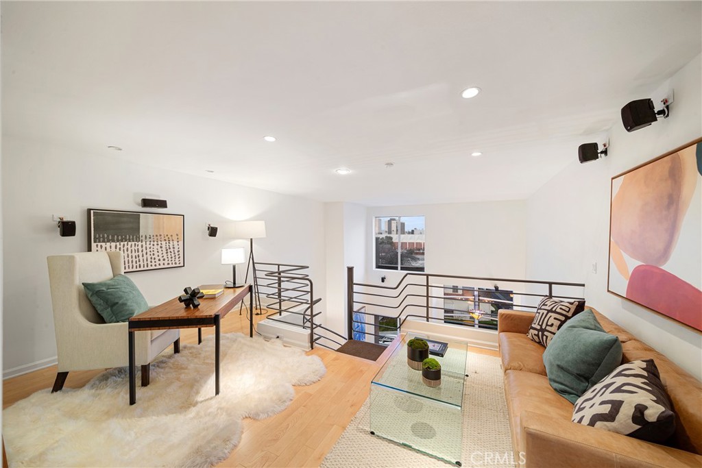 4557 Haskell Avenue, Unit 301 Encino, CA 91436 - Photo 30 of 40 a living room with furniture and a couch