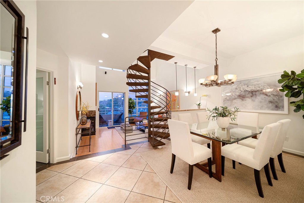 4557 Haskell Avenue, Unit 301 Encino, CA 91436 - Photo 7 of 40 a view of dining room and hall with furniture