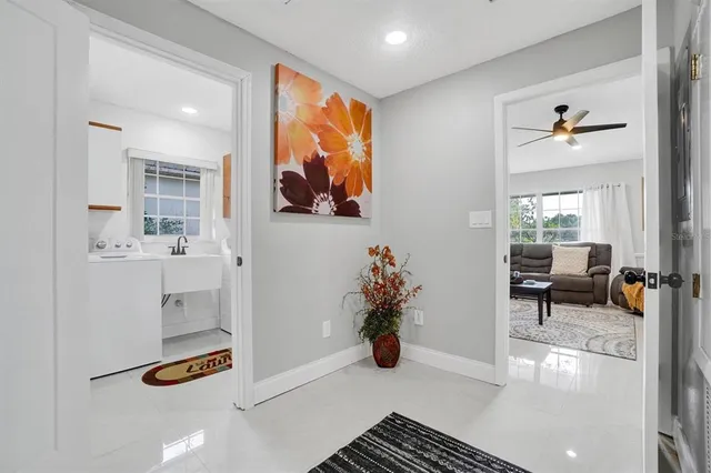 a view of kitchen with furniture and wooden floor