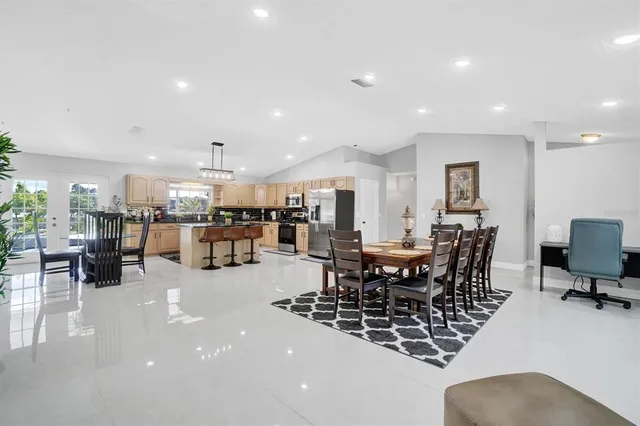 a view of a dining room with furniture