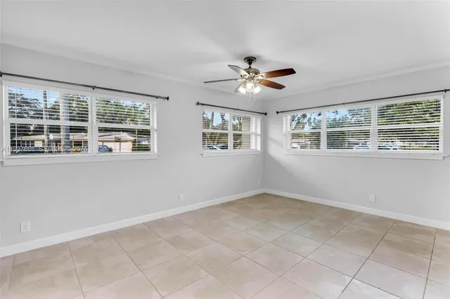 a view of a storage and utility room with washer and dryer
