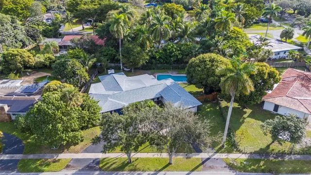 a view of swimming pool from a balcony