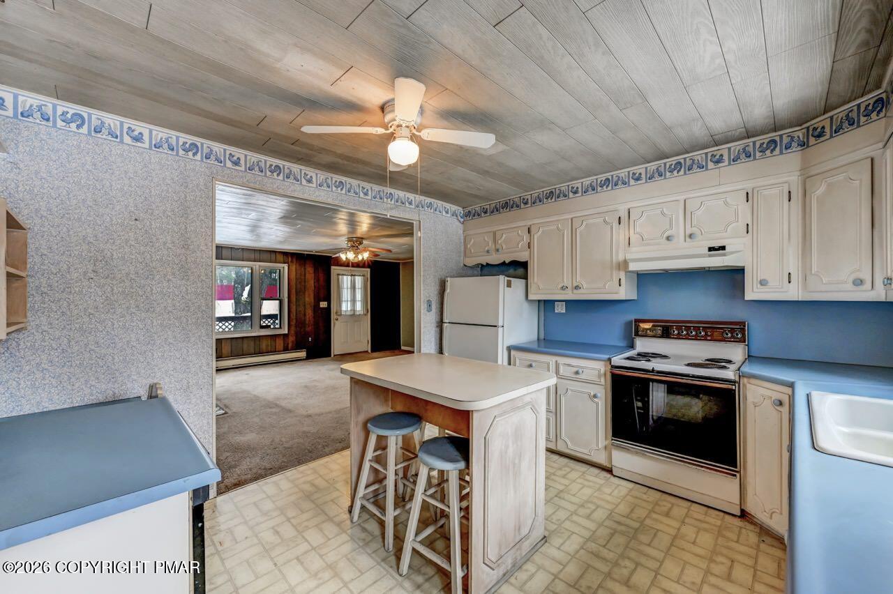 1912 Johns Road Effort, PA 18330 - Photo 16 of 46 Kitchen w/ Bar Top Island