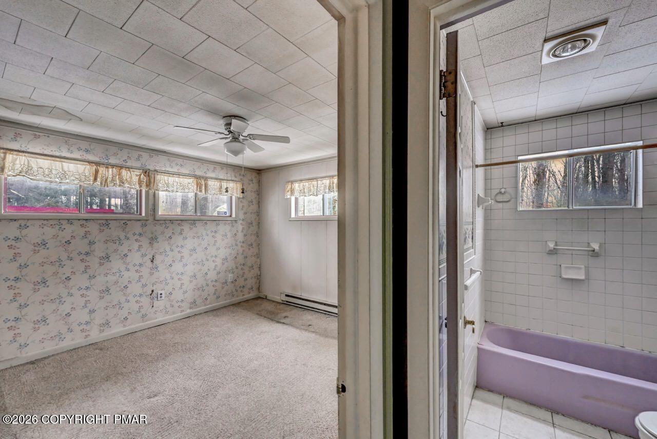 1912 Johns Road Effort, PA 18330 - Photo 30 of 46 Primary Bedroom & Full Bath