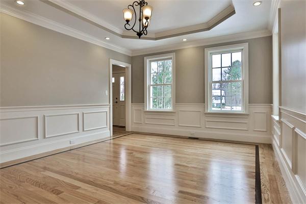 7 Davis Road Bedford, MA 01730 - Photo 15 of 30 a view of empty room with wooden floor and fan