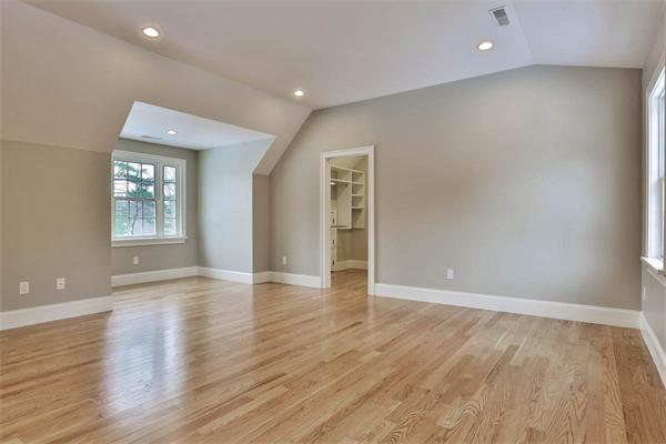 7 Davis Road Bedford, MA 01730 - Photo 20 of 30 an empty room with wooden floor and windows