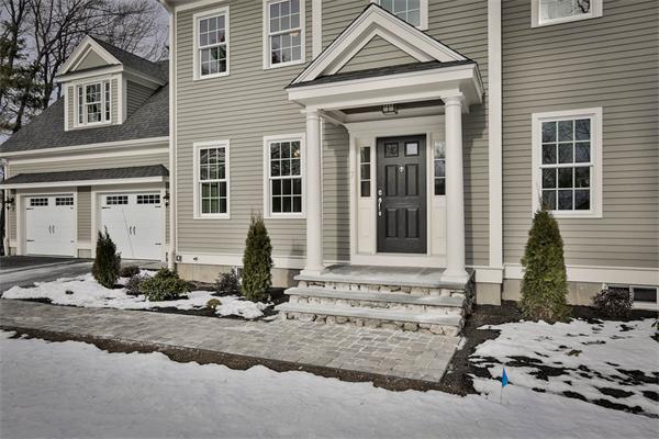7 Davis Road Bedford, MA 01730 - Photo 2 of 30 a front view of a house with a yard