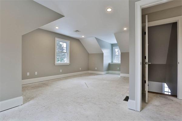 7 Davis Road Bedford, MA 01730 - Photo 26 of 30 an empty room with a bathroom and a window