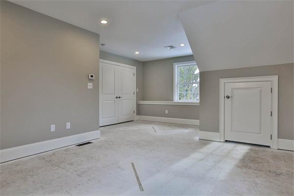 7 Davis Road Bedford, MA 01730 - Photo 27 of 30 a view of an empty room with a window