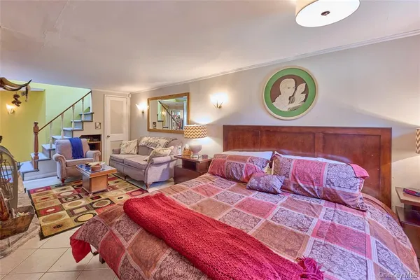 a living room with furniture and next to a window