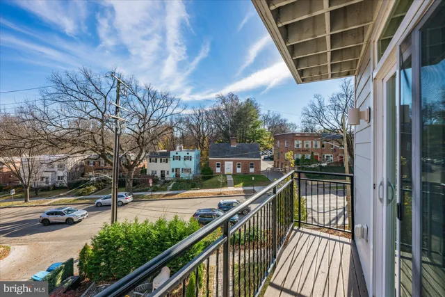 a view of a balcony with staircase