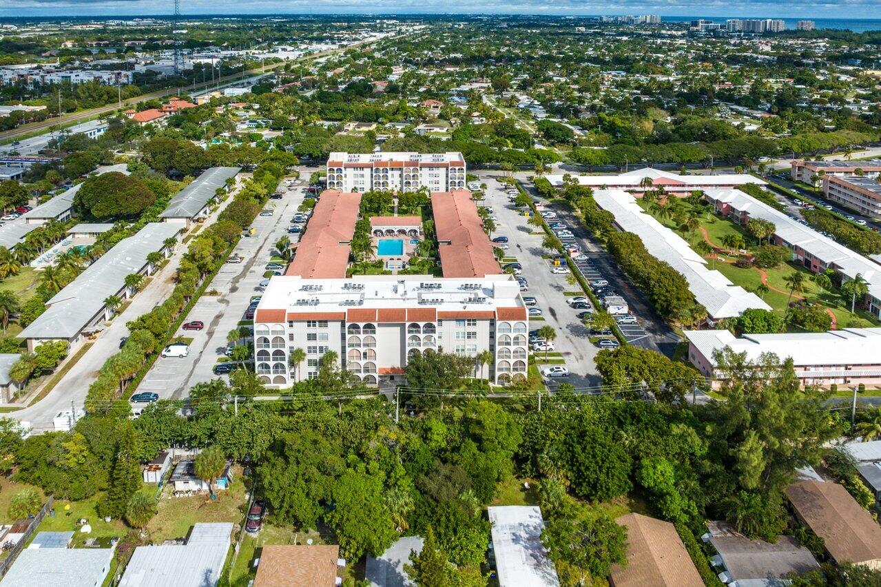 250 Northeast 20th Street, Unit 2250 Boca Raton, FL 33431 - Photo 20 of 22 an aerial view of residential houses with outdoor space