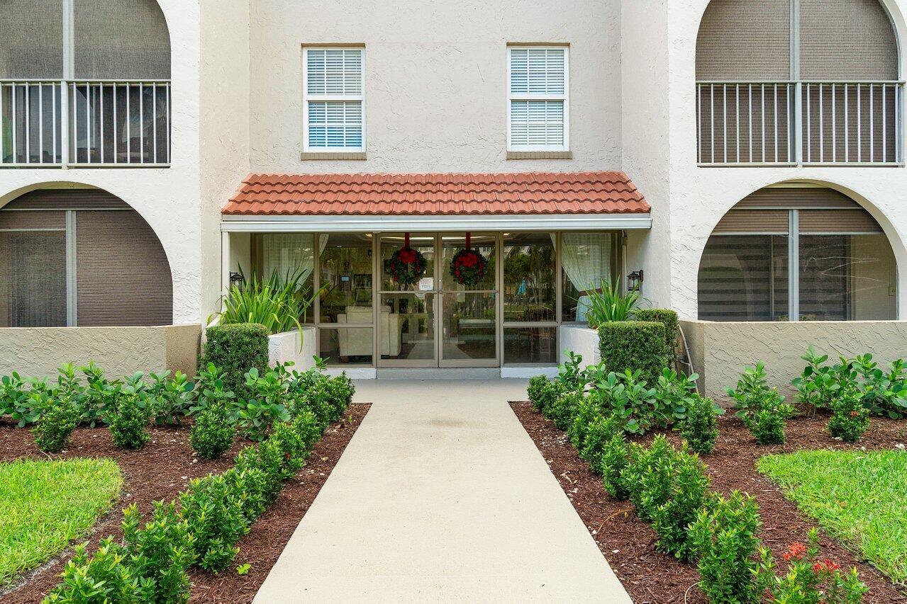 250 Northeast 20th Street, Unit 2250 Boca Raton, FL 33431 - Photo 2 of 22 front view of a house