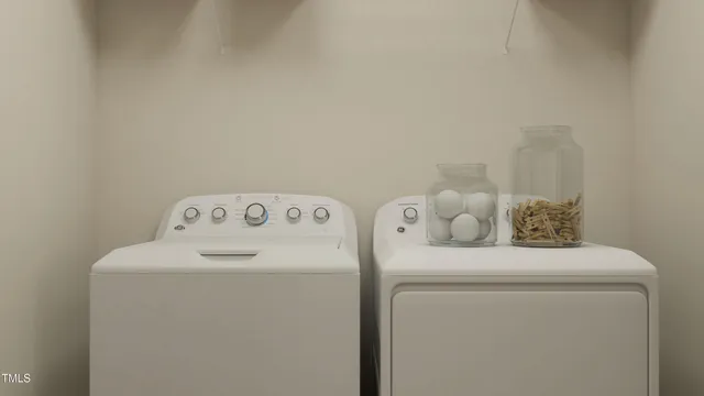 a bedroom with a bed and a table