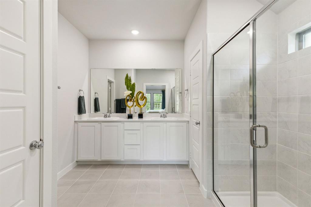 1932 Callington Way Forney, TX 75126 - Photo 15 of 25 a bathroom with a shower and a sink