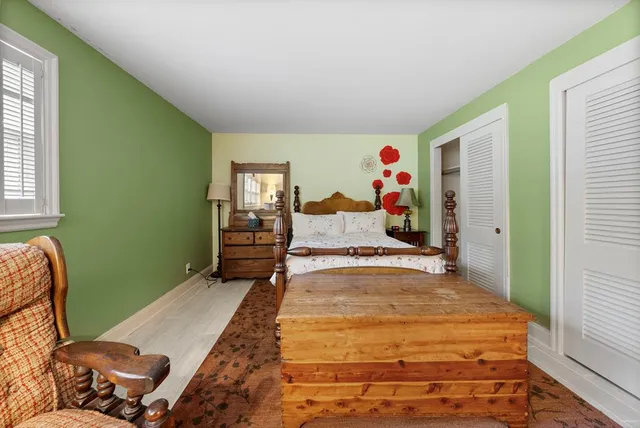 a room with furniture and a window