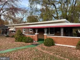 a view of a house with a garden