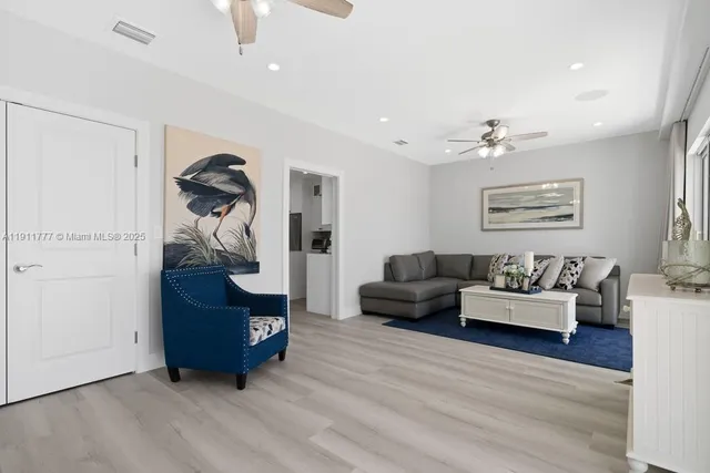 a view of an entryway and livingroom