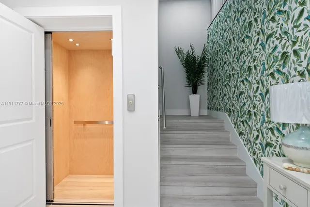 a bathroom with a double vanity sink toilet and shower