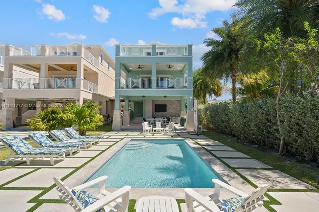a view of a patio with swimming pool