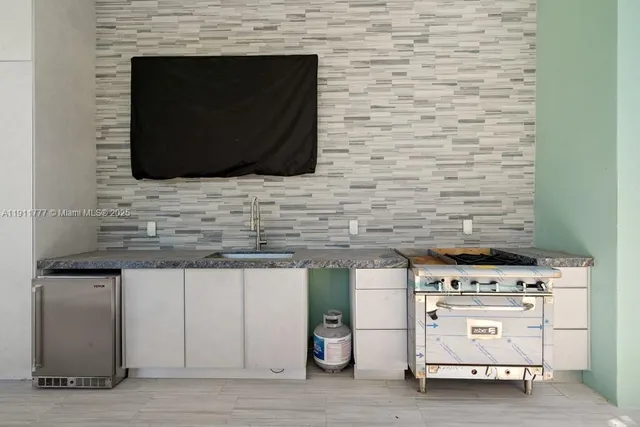 an aerial view of a city with ocean view