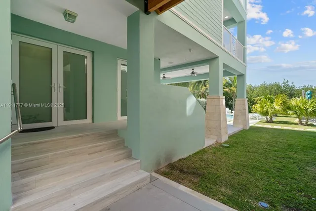 an aerial view of a city with ocean view